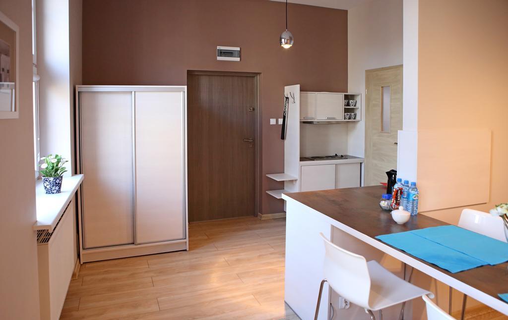 Apartamenty W Sercu Chelmna Хелмно Номер фото