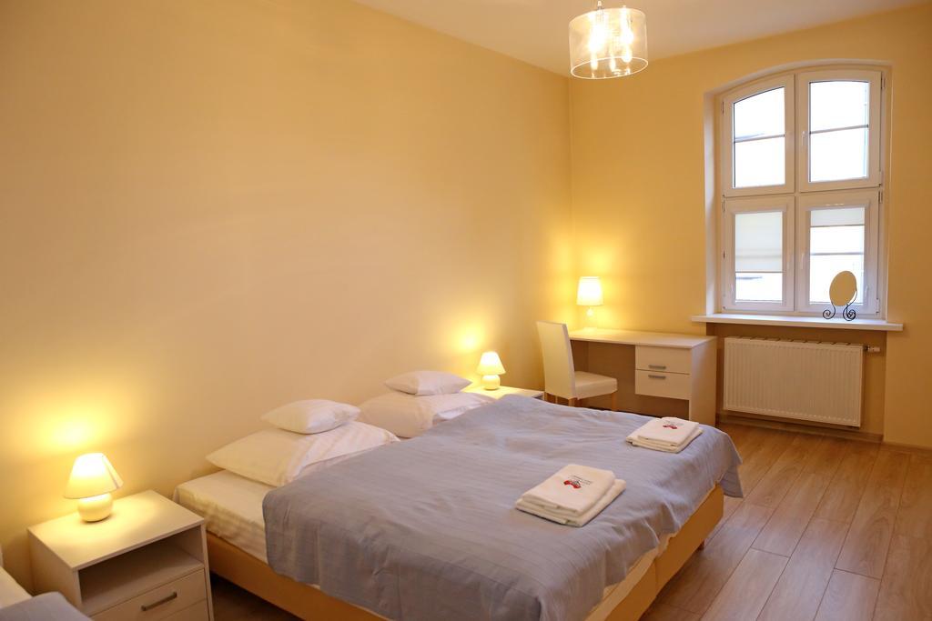 Apartamenty W Sercu Chelmna Хелмно Номер фото